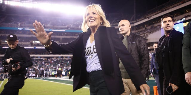 First lady Jill Biden walks the sideline prior to the game between the Philadelphia Eagles and the Dallas Cowboys at Lincoln Financial Field on Oct. 16, 2022.