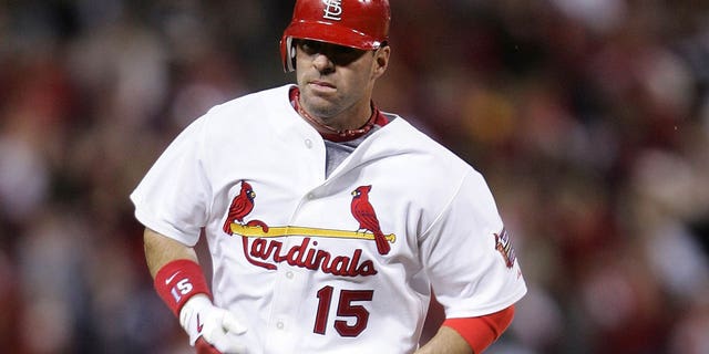Jim Edmonds of the St. Louis Cardinals rounds the bases after hitting a two-run home run in the fifth inning against the Arizona Diamondbacks May 12, 2006, at Busch Stadium in St. Louis, Mo. 