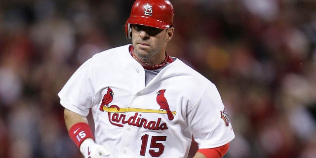 Jim Edmonds of the St. Louis Cardinals rounds the bases after hitting a two-run home run in the fifth inning against the Arizona Diamondbacks May 12, 2006, at Busch Stadium in St. Louis, Mo.