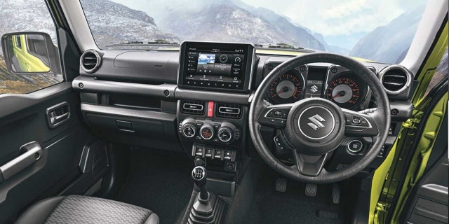 The Jimny's interior features a back-to-basics design.