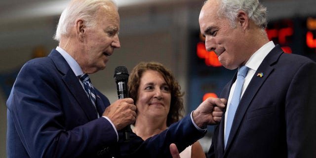 President Joe Biden arrives with Sen. Bob Casey and his wife Terese to speak at Wilkes University in Wilkes-Barre, Pennsylvania, on Aug. 30, 2022.