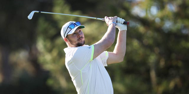 Buffalo Bills quarterback Josh Allen plays his shot from the 12th tee during the second round of the AT and T Pebble Beach Pro-Am at Spyglass Hill Golf Course Feb.  4, 2022, in Pebble Beach, Calif.