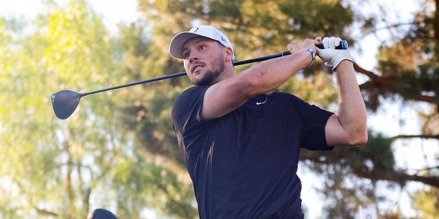 Josh Allen plays a shot during Capital One's The Match VI — Brady and Rodgers v. Allen and Mahomes at Wynn Golf Club June 1, 2022, in Las Vegas.
