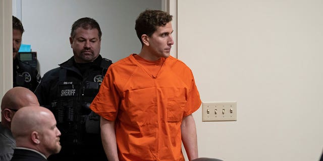 Brian Kochberger (right), who is accused of killing four University of Idaho students in November 2022, is escorted into the courtroom for a hearing at Latah County District Court on Thursday, January 5, 2023, in Moscow, Idaho. 