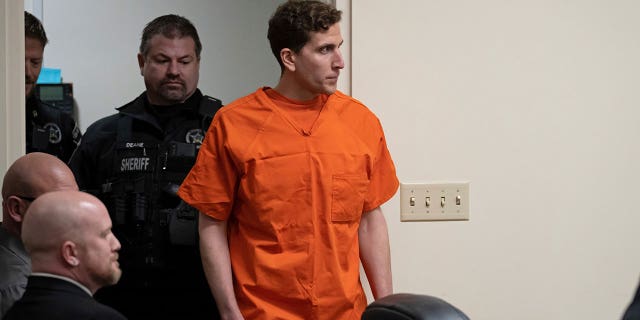 Bryan Kohberger, right, who is accused of killing four University of Idaho students in November 2022, is escorted into a courtroom for a hearing in Latah County District Court, Thursday, Jan. 5, 2023, in Moscow, Idaho. 