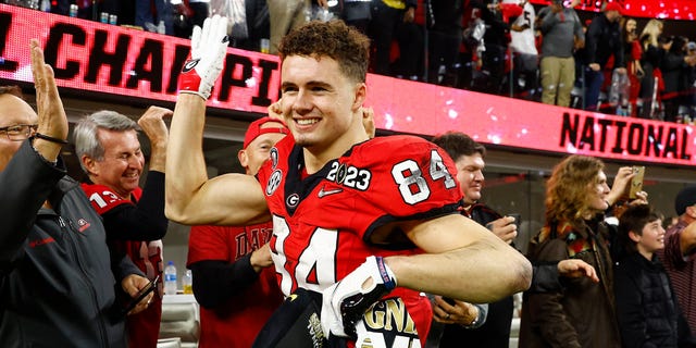 Ladd McConkey #84 of the Georgia Bulldogs celebrates with fans after defeating the TCU Horned Frogs in the College Football Playoff National Championship game at SoFi Stadium on January 09, 2023 in Inglewood, California.