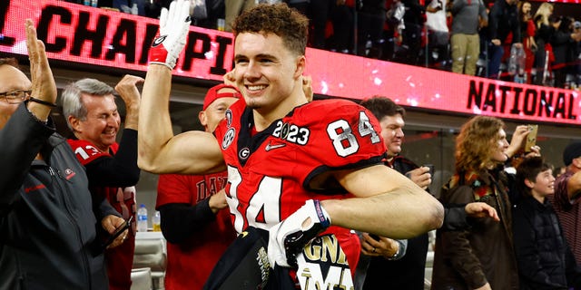 Ladd McConkey #84 of the Georgia Bulldogs celebrates with fans after defeating the TCU Horned Frogs in the College Football Playoff National Championship game at SoFi Stadium on January 09, 2023 in Inglewood, California.