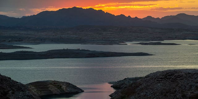 Lake Mead, the country's largest man-made water reservoir, is seen during a sunrise on July 13, 2022.