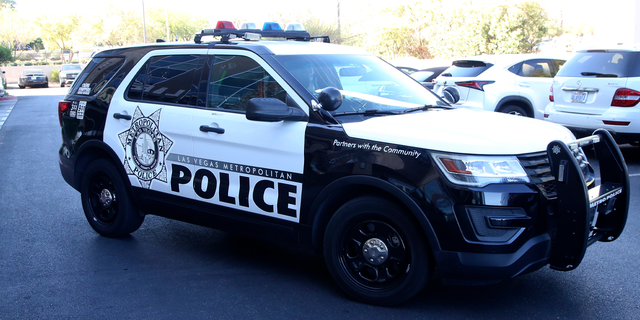 LAS VEGAS, NEVADA - OCTOBER 28: A Las Vegas Metropolitan Police Department vehicle blocks traffic during the NV COVID Trace Community Activation at Life Time Athletic on October 28, 2020, in Las Vegas, Nevada. The Activation was organized by Greg Chase of Experience Strategy Associates and Douglas Johnson of E+ Productions as a state wide PSA around COVID Trace, Nevada's contact tracing app. 