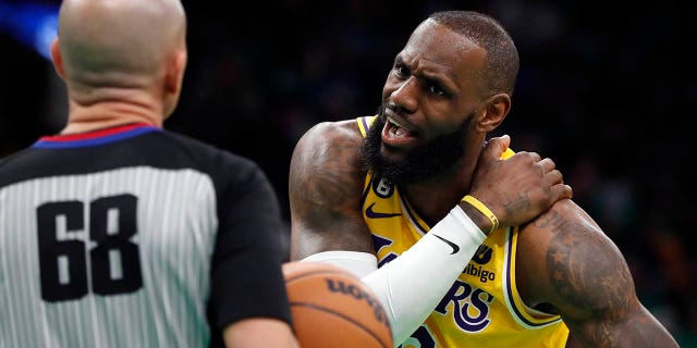 Los Angeles Lakers' LeBron James (6) discusses a call during the first half of the team's game against the Boston Celtics on Saturday, Jan. 28, 2023, in Boston. 