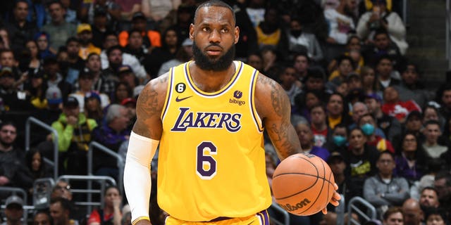 LeBron James, #6 of the Los Angeles Lakers, dribbles the ball during the game against the LA Clippers on January 24, 2023 at Crypto.Com Arena in Los Angeles.