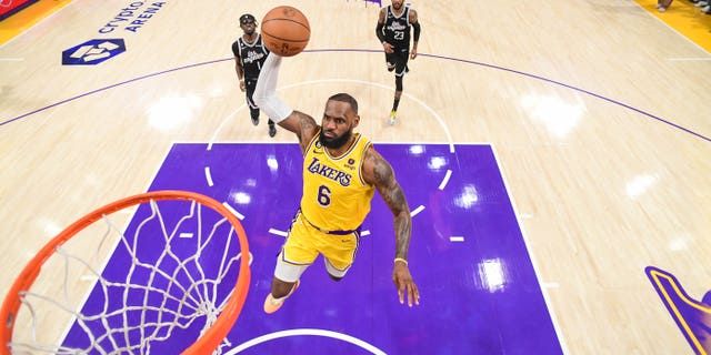 LeBron James #6 of the Los Angeles Lakers drives to the basket during the game against the LA Clippers on January 24, 2023 at Crypto.Com Arena in Los Angeles, California.