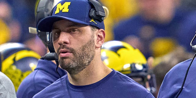 Michigan Wolverines co-offensive coordinator Matt Weiss during the Big Ten championship game against the Iowa Hawkeyes Dec. 4, 2021, at Lucas Oil Stadium in Indianapolis.