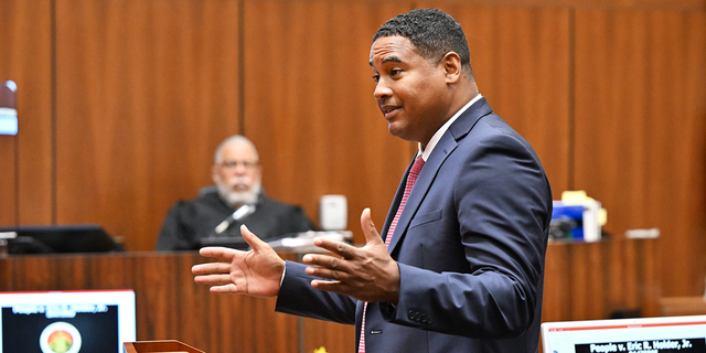 Deputy District Attorney John McKinney (R) speaks to the jury as Judge H. Clay Jacke listens during closing arguments in the People v Eric Holder, Jr. trial over the death of Nipsey Hussle on June 30, 2022 in Los Angeles, California. (Photo by Frederic J. Brown-Pool/Getty Images)