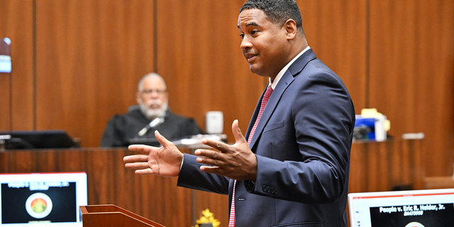 Deputy District Attorney John McKinney (R) speaks to the jury as Judge H. Clay Jacke listens during closing arguments in the People v Eric Holder, Jr. trial over the death of Nipsey Hussle on June 30, 2022 in Los Angeles, California. (Photo by Frederic J. Brown-Pool/Getty Images)