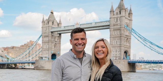 Hudson and Emily Crider are pictured visiting the Tower Bridge in London.