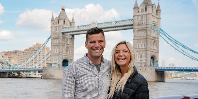 Hudson and Emily Crider are pictured visiting the Tower Bridge in London.