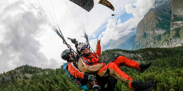 Hudson and Emily Crider experienced paragliding in Switzerland.