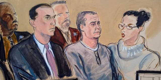 In this Jan 3, 2020 file courtroom sketch, defense attorney Cesar de Castro, left, Mexico's former top security official, Genaro Garcia Luna, center, and a court interpreter, appear for an arraignment hearing in Brooklyn federal court
