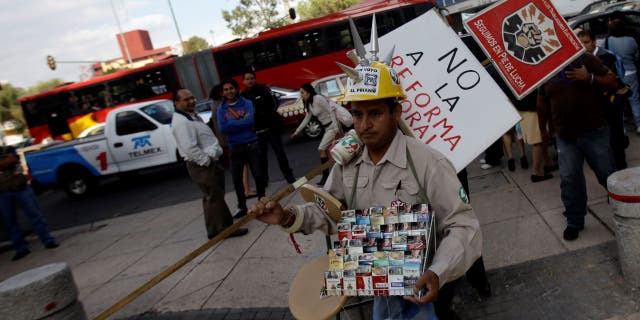 A street vendor selling cigarettes in Mexico