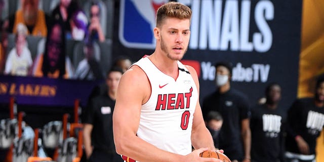 Meyers Leonard, #0 of the Miami Heat, handles the ball during the game against the Los Angeles Lakers during Game Two of the NBA Finals on October 2, 2020 at The AdventHealth Arena at ESPN Wide World Of Sports Complex in Orlando, Florida .