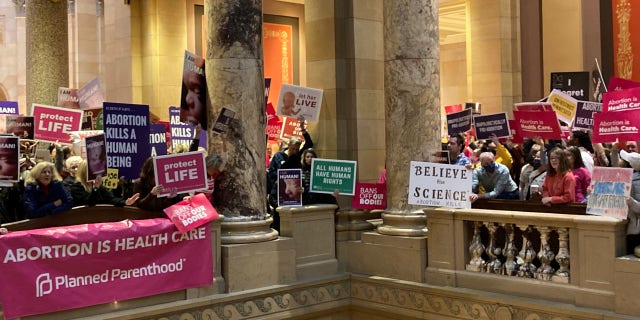 Pro-life and pro-choice protesters flocked to the Minnesota State Capitol building to voice their opinions on the PRO Act Friday.