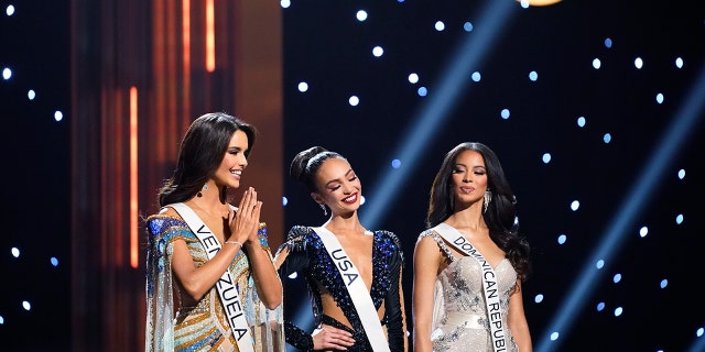 The final three contestants react during the 71st Miss Universe pageant, in New Orleans on Saturday, Jan. 14, 2023. From left are Miss Venezuela Amanda Dudamel, Miss USA R'Bonney Gabriel and Miss Dominican Republic Andreína Martínez. 