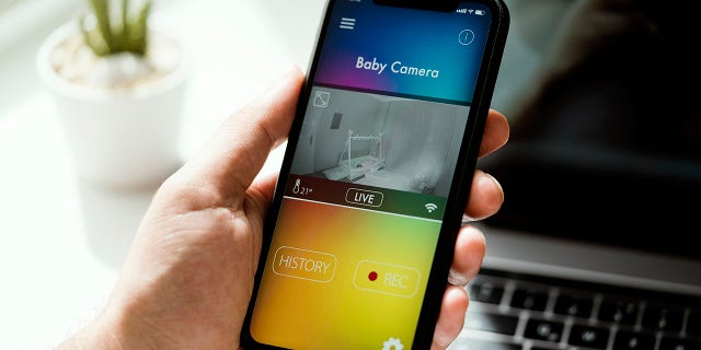 A baby monitoring app is shown on a smartphone screen. "I have profound respect for the quickness with which kids can have life-threatening injuries," said Dr. Meg Meeker of Michigan.