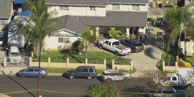 Authorities in San Bernardino, California investigate a triple homicide at a home Tuesday.