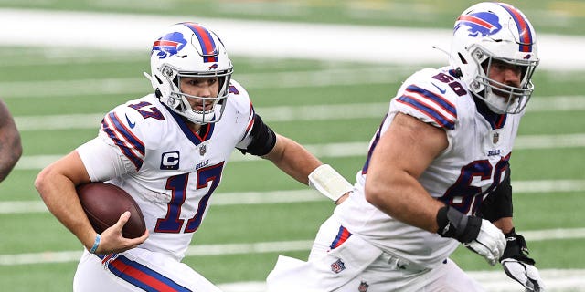 Quarterback Josh Allen (17) of the Buffalo Bills runs with the ball against the New York Jets in the fourth quarter of a game at MetLife Stadium Oct. 25, 2020, in East Rutherford, N.J.