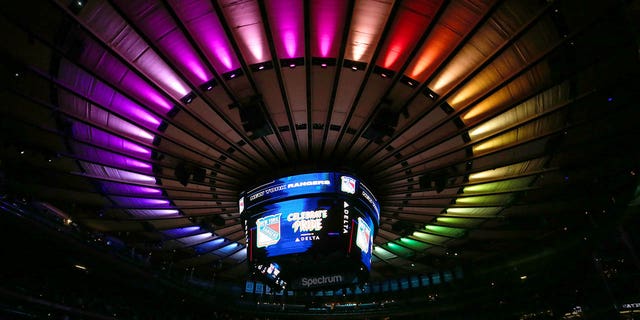 Rainbow-colored lights are projected onto the roof of Madison Square Garden to celebrate Pride Night before a game between the New York Rangers and Los Angeles Kings on January 24, 2022 in New York City. 