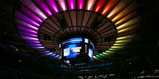 Rainbow-colored lights are projected onto the roof of Madison Square Garden to celebrate Pride Night before a game between the New York Rangers and Los Angeles Kings on January 24, 2022 in New York City. 