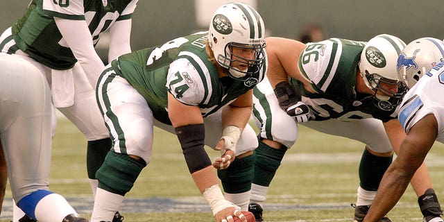New York Jets center Nick Mangold prepares to throw the ball against the Detroit Lions on October 22, 2006, at the Meadowlands in East Rutherford, New Jersey.