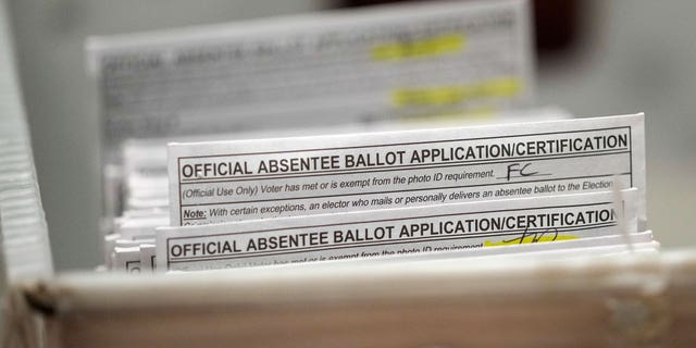 Military members are skeptical of an Ohio election integrity law that would restrict mail-in voting availability.