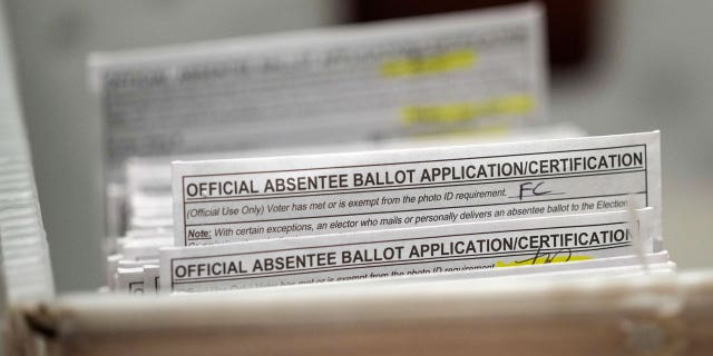 Military members are skeptical of an Ohio election integrity law that would restrict mail-in voting availability.