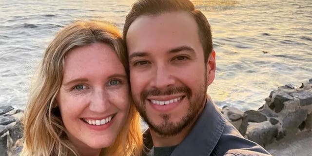 California public defender, Elliot Blair, and his wife, Kim, smile in a photo from a GoFundMe page. 