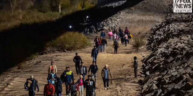 Migrants flood into Yuma at record-high numbers in the past year, putting strain on the town's resources. 