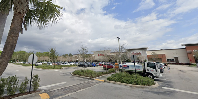 The shopping center in Royal Palm Beach, Florida, where 22-year-old Giovanni Radu is accused of pretending to play the violin while aggressively soliciting donations, according to authorities. 