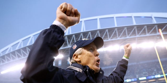 Head coach Pete Carroll of the Seattle Seahawks celebrates after defeating the Los Angeles Rams in overtime at Lumen Field on January 08, 2023 in Seattle, Washington.