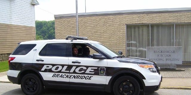 Brackenridge police car. Brackenridge Police Chief Justin McIntyre was shot dead Monday. Suspect Aaron Swann, 28, died hours later in a shootout with Pittsburgh police.