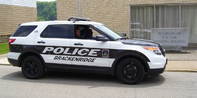 Brackenridge police car. Brackenridge Police Chief Justin McIntyre was shot dead Monday. Suspect Aaron Swann, 28, died hours later in a shootout with Pittsburgh police.