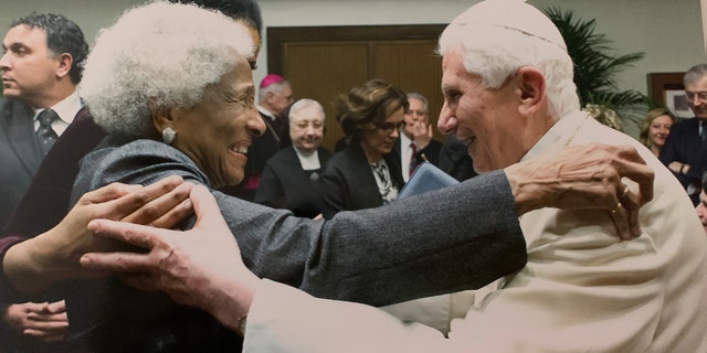 Lauren Green's mother embraces Pope Emeritus Benedict on Jan. 15, 2014.