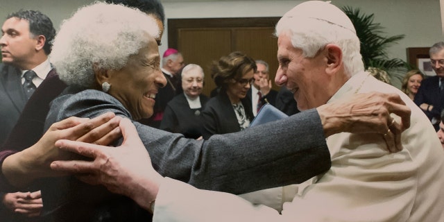 Lauren Green's mother embraces Pope Emeritus Benedict on Jan. 15, 2014.