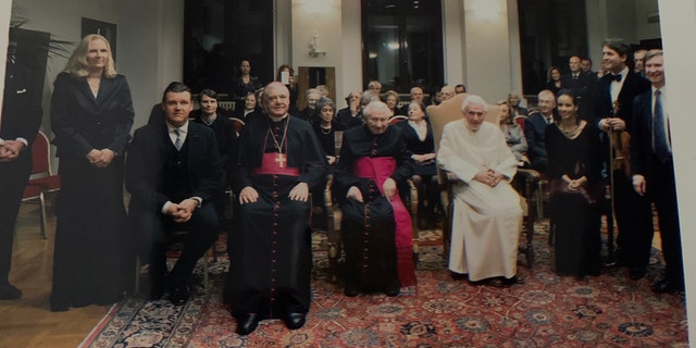 Pope Emeritus Benedict and his fellow clergymen