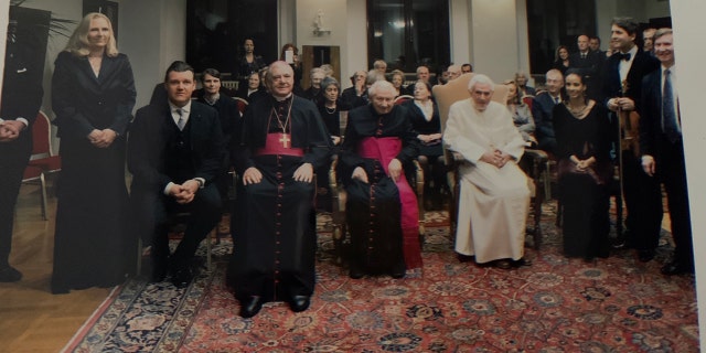 Pope Emeritus Benedict and his fellow clergymen