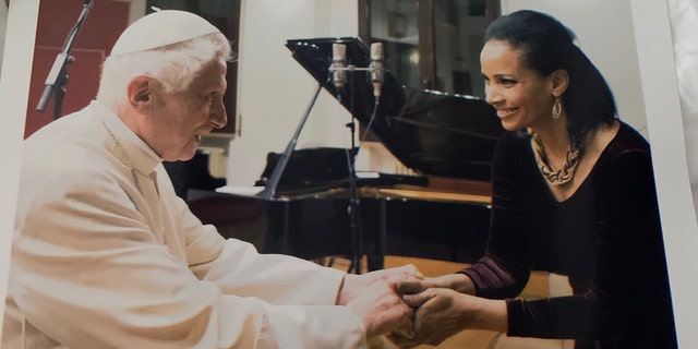 Lauren Green greets Pope Emeritus Benedict at the Vatican on Jan. 15, 2014.