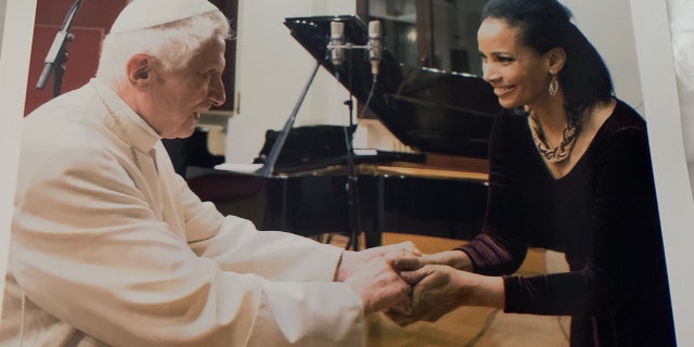 Lauren Green greets Pope Emeritus Benedict at the Vatican on Jan. 15, 2014.