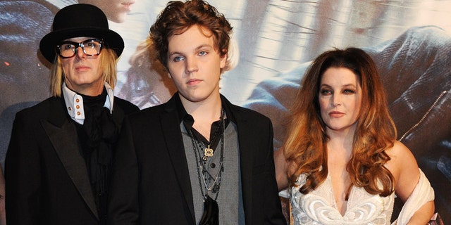 Michael Lockwood, Ben Keough and Lisa Marie Presley seen at the premiere of "Harry Potter And The Deathly Hallows: Part 1" in 2010.