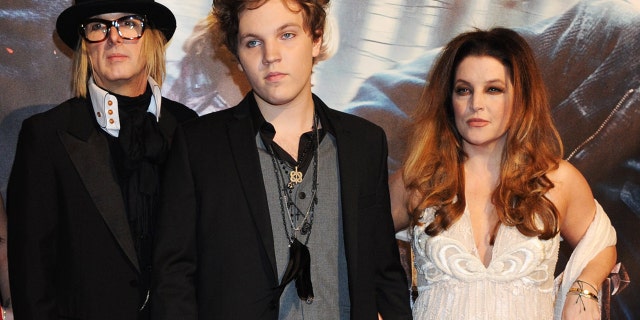 Michael Lockwood, Ben Keough and Lisa Marie Presley seen at the premiere of "Harry Potter And The Deathly Hallows: Part 1" in 2010.