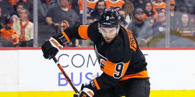 Ivan Provorov #9 of the Philadelphia Flyers skates with the puck past Max Jones #49 of the Anaheim Ducks during the third period at Wells Fargo Center on January 17, 2023 in Philadelphia, Pennsylvania.